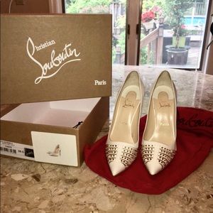Never Worn White Louboutin heels